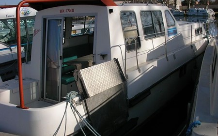 Triton 1060 Handi tourisme ballade france vacance bateau vedette peniche penichette