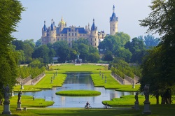 Schwerin Castle with its park and basins in the foreground, Germany